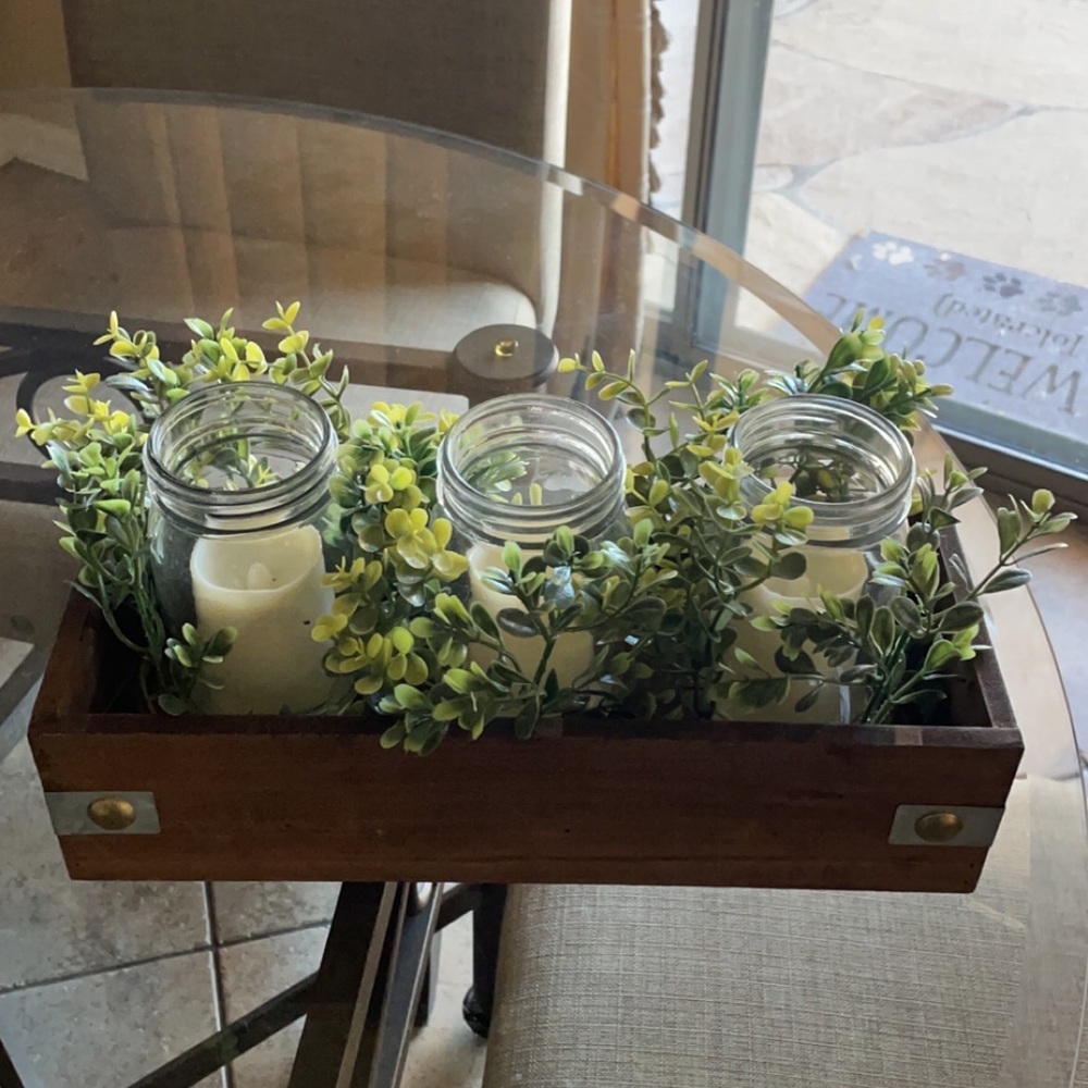 wooden decal with fake succulents and battery powered candles